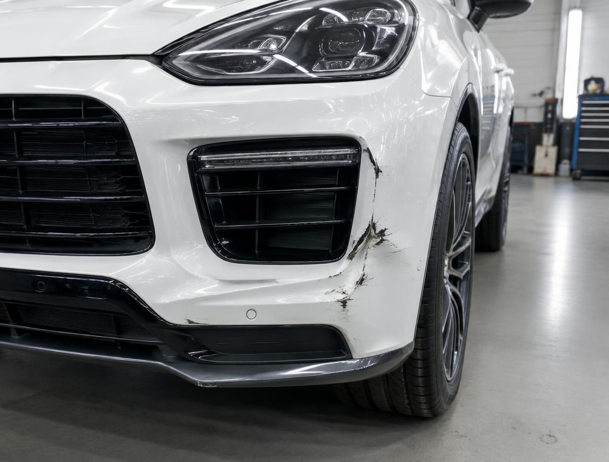 Damaged bumper before repair